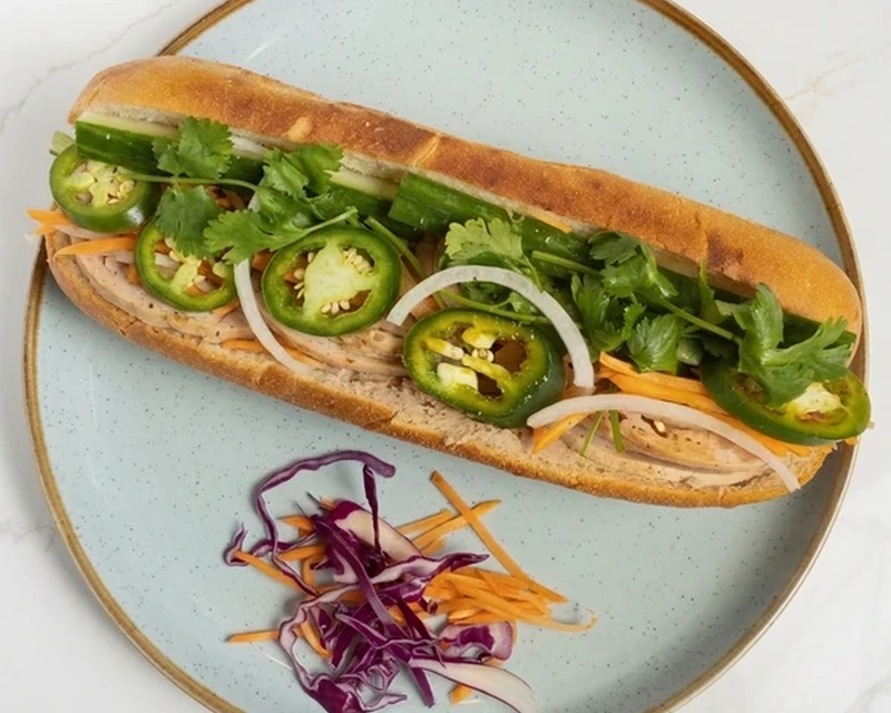 Lemongrass Grilled Chicken Sub banh mi on an 11 inch baguette at Bon Vietnamese Cuisine, Redstone, Calgary
